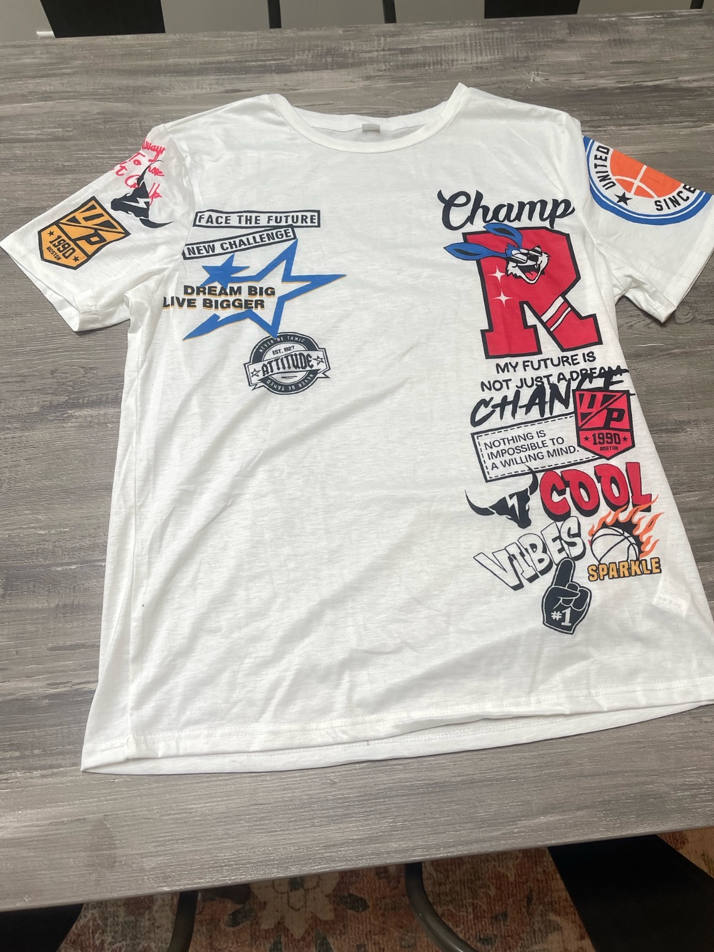 White Athletic Graphic Tee with Colorful Patches